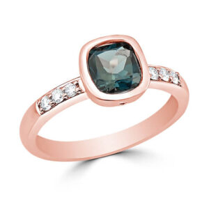14KT rose gold blue topaz and diamond ring