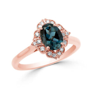 14KT rose gold blue topaz and diamond ring